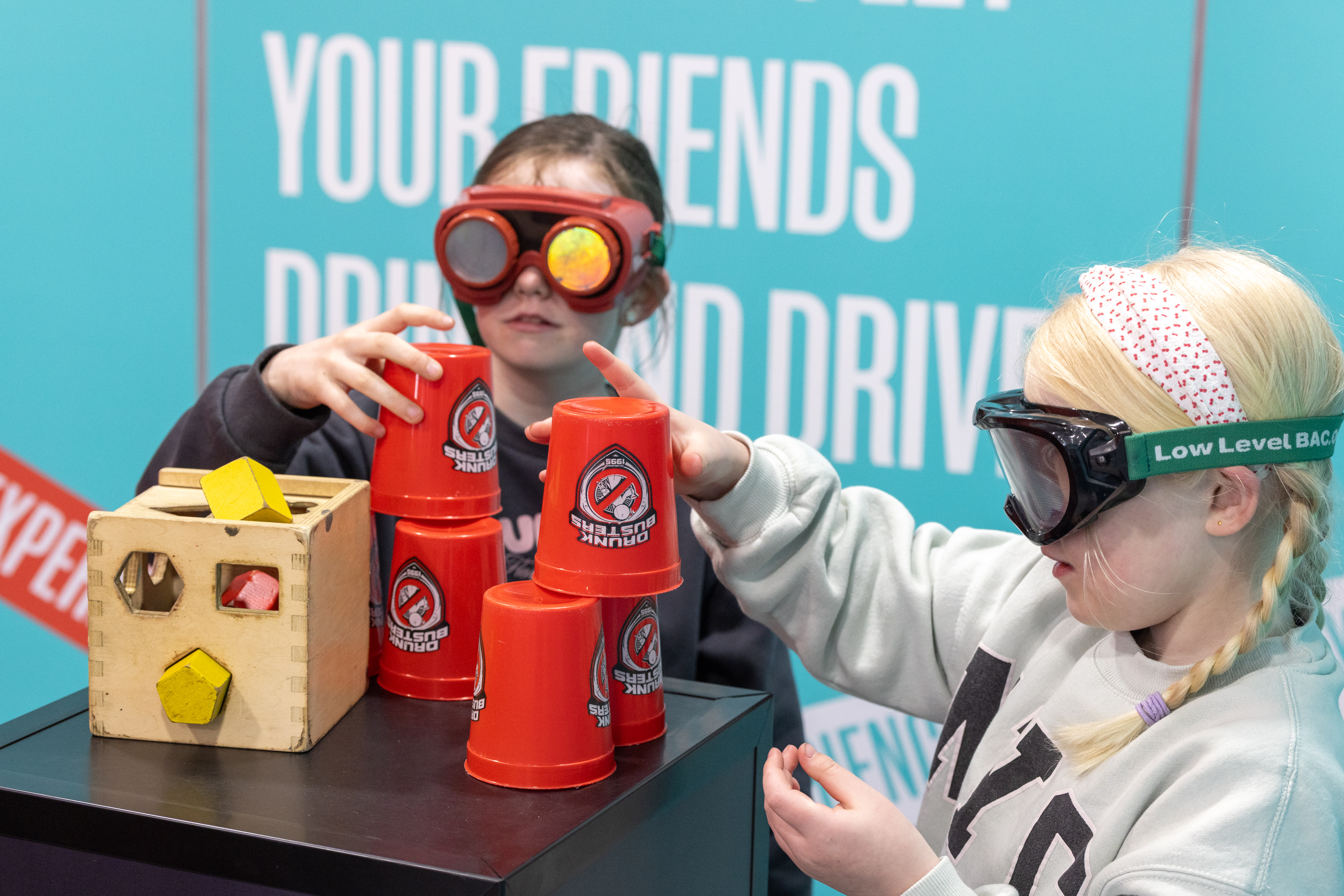 Children wearing goggles playing. 